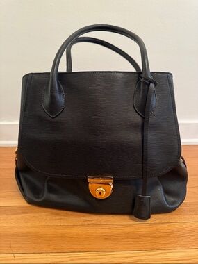 Salvatore Ferragamo Black Leather Top-Handle Satchel with Gold Hardware.
